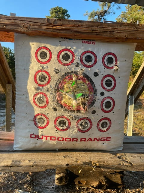 How to sight in a compound bow with a bow sight.